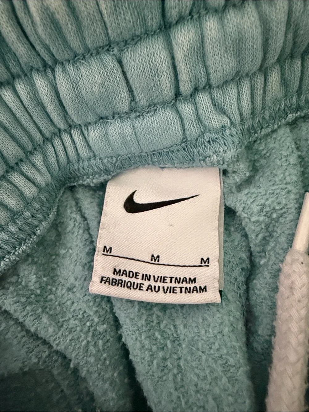 Nike turquoise stone-washed shorts, youth medium